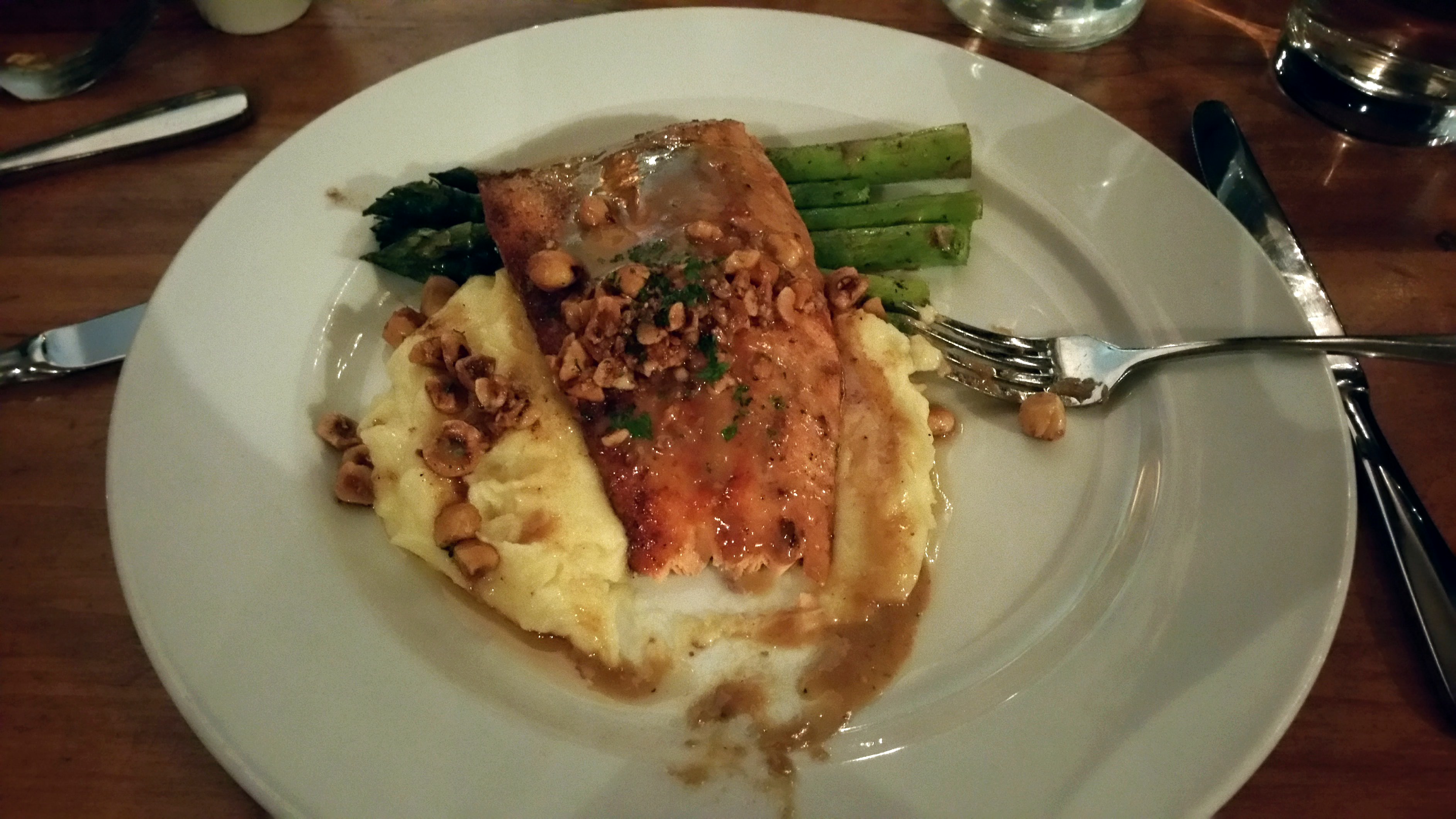 This is what I had for dinner the second night. Ruby Red Trout with brown sugar bourbon sauce, grilled asparagus, toasted hazelnuts, Yukon gold mashers. YUM! I never eat fish without tarter sauce, no matter what kind, but the sauce was fantastic! My husband only likes ribeye steak. That's it. The only steak that they have is a Flat Iron Steak. He ordered it because all of the other places were either closing, or closed for the season. His steak came with cimichurri, bacon braised kale, and hand cut fries. He was pleasantly surprised!